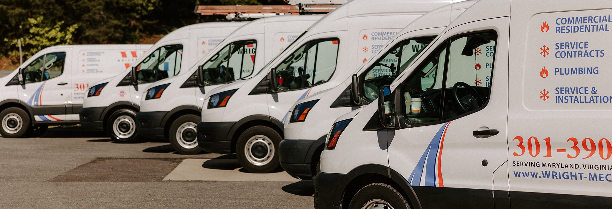 The fleet of Wright Mechanical HVAC service vehicles.