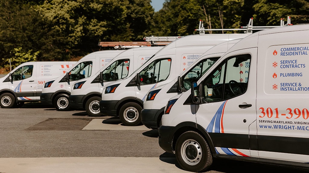 The fleet of Wright Mechanical HVAC service vehicles.
